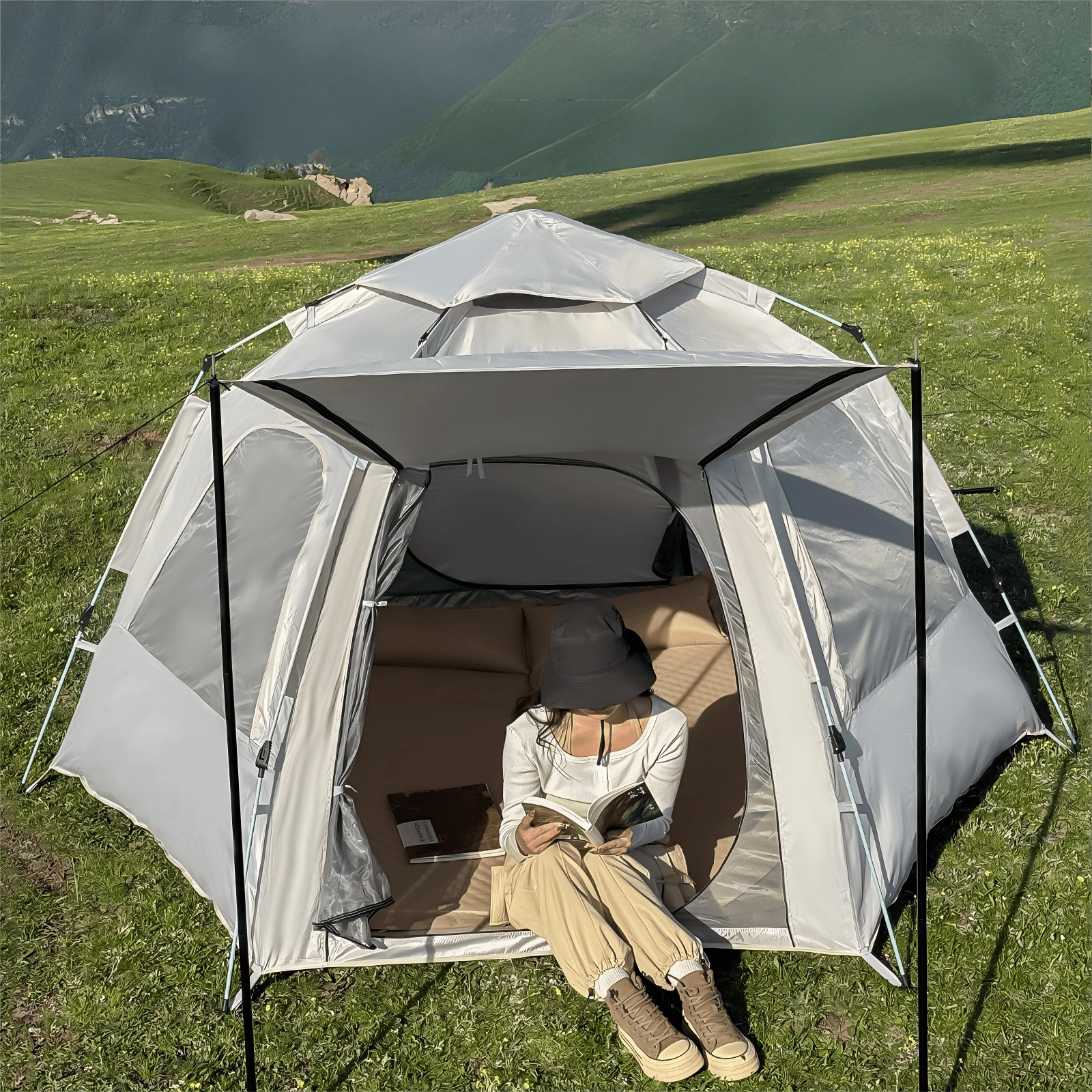 Grassland camping hexagon tent hexagon camping tent on grass field outdoor family camping setup